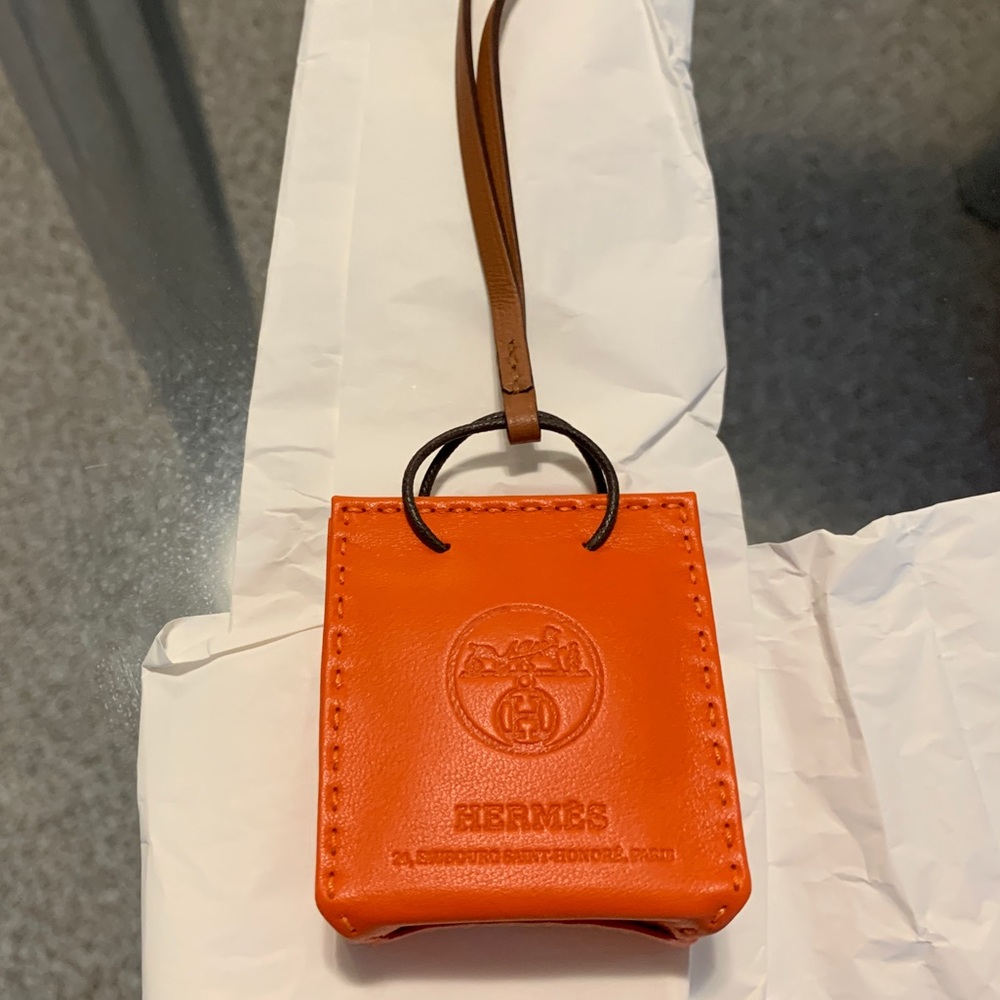 Hermès orange bag charm